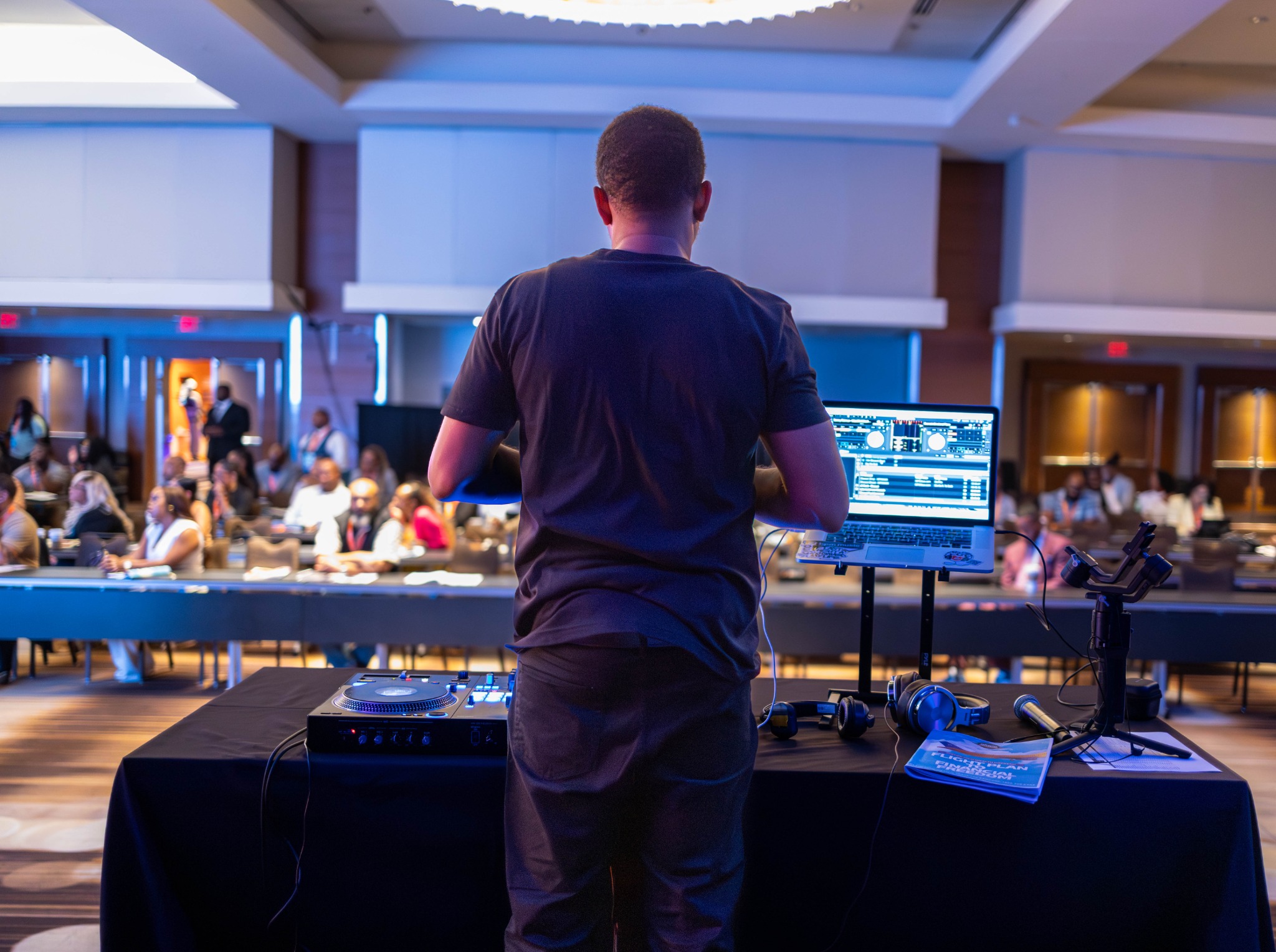 DJ Battio leading a corporate workshop and DJ engagement experience