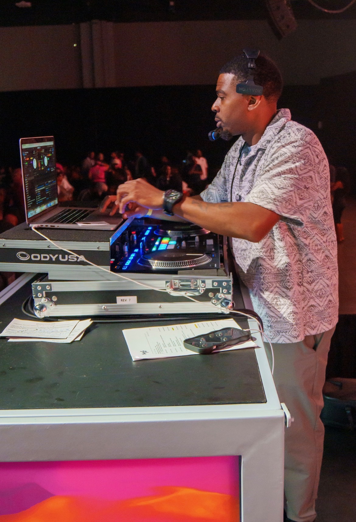 DJ Battio performing live at the DJ booth