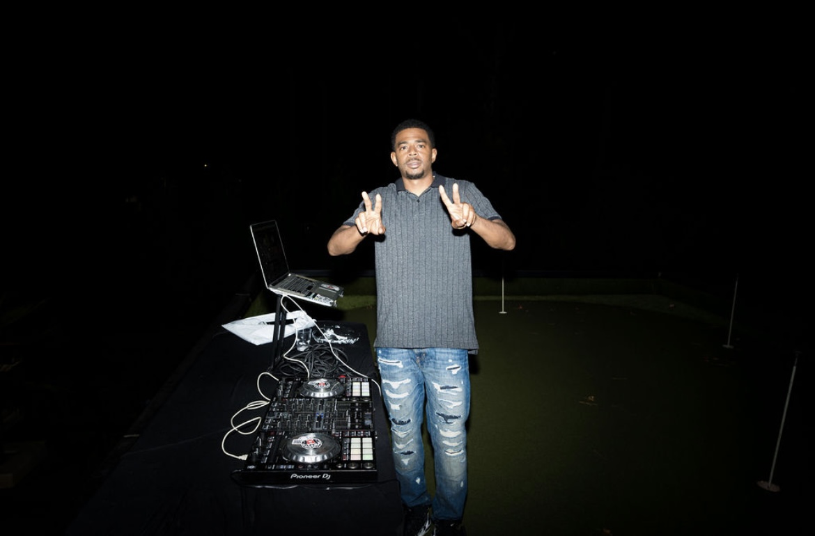 DJ Battio performing at a professional event