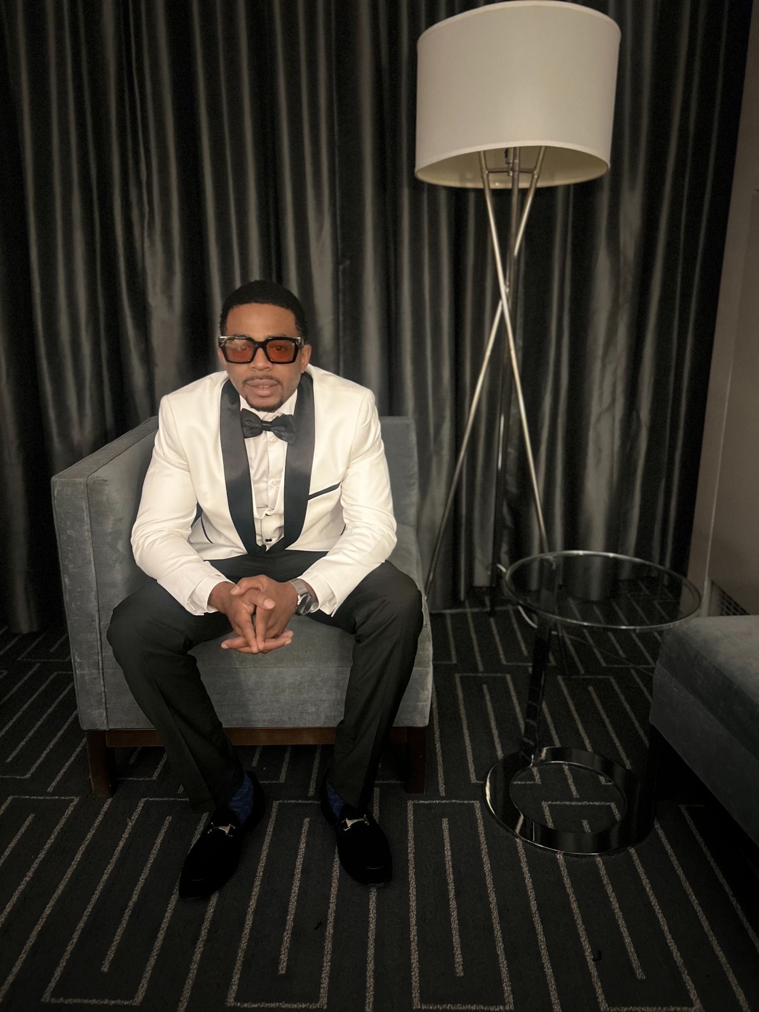 DJ Battio dressed for an upscale event
